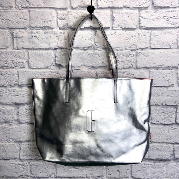 Clinique Handbags - ❄️ Clinique Silver Tote Bag